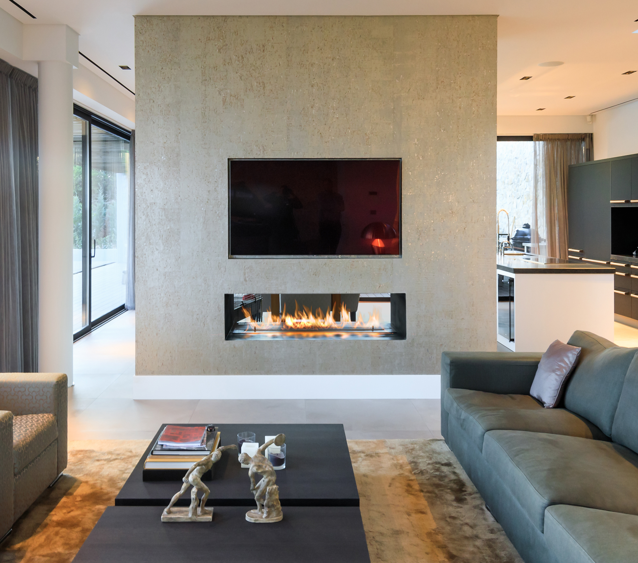 TV placed over a tunnel automatic ethanol burner.